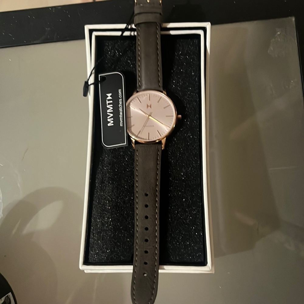 Brand new gray and rose gold MVMT watch